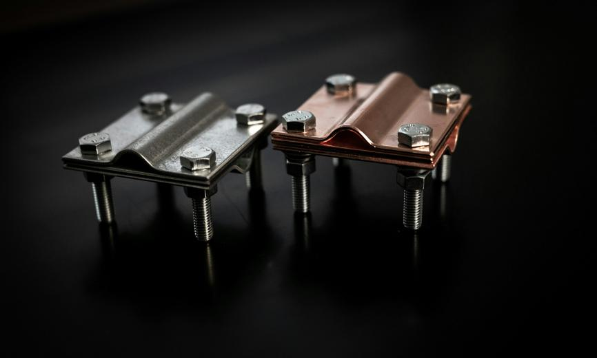 Figure 2: Copper and aluminum busbars — the two dominant conductor materials used in electrical switchgear